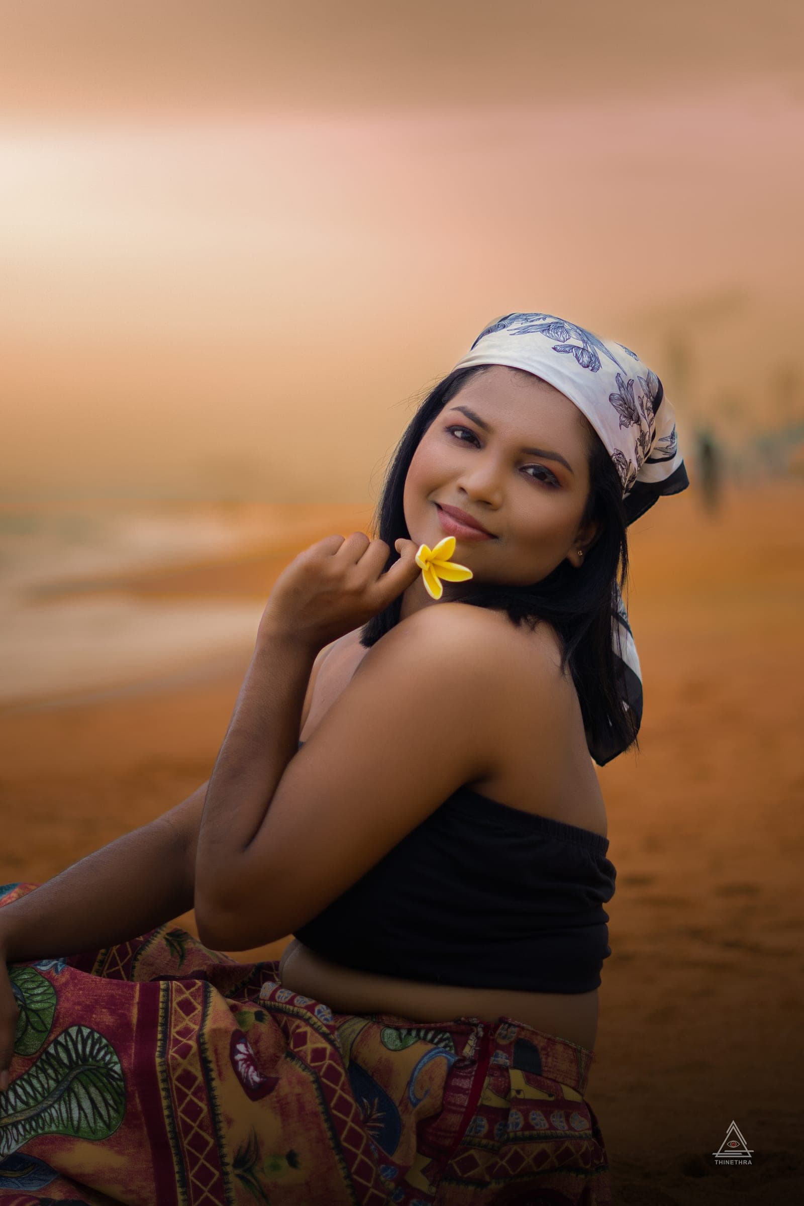 Chandima and her son on the beach at sunset, photo 4 of 13