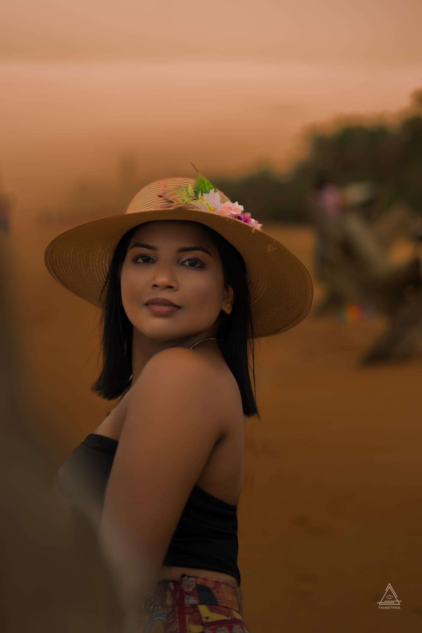 Chandima and her son on the beach at sunset, photo 11 of 13