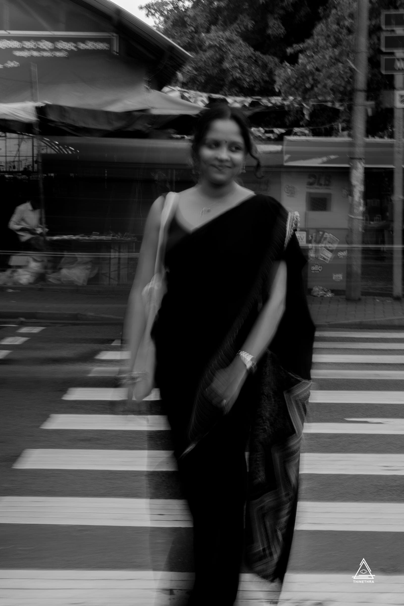 Portrait of Sandu in a black saree in the city, photo 14 of 26