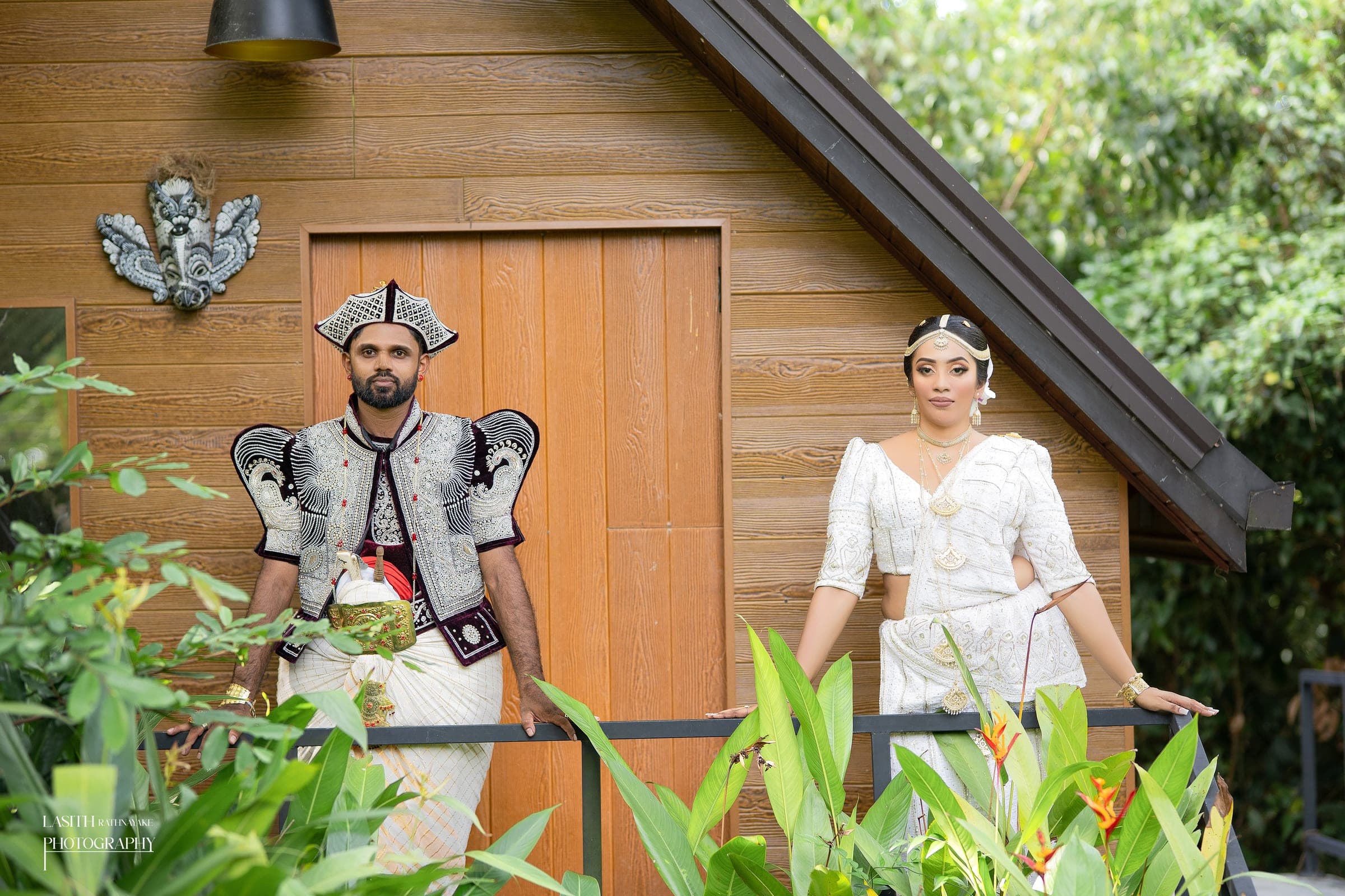 Tharushi and her groom in Kandyan wedding dress, photo 19 of 27